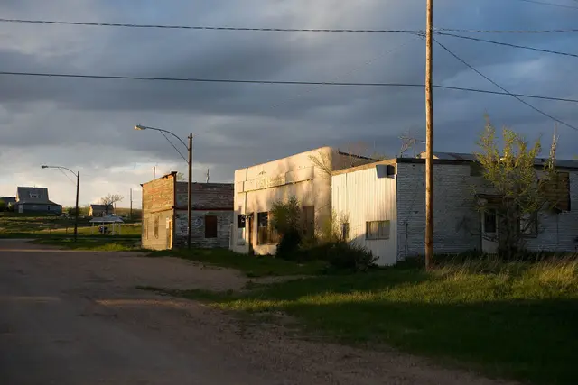 Abandoned storefronts on a gravel street